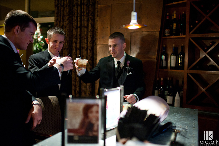 Arden Hills Resort Club Wedding by Sacramento Wedding photographer Teresa K groomsmen at the bar in Sacramento