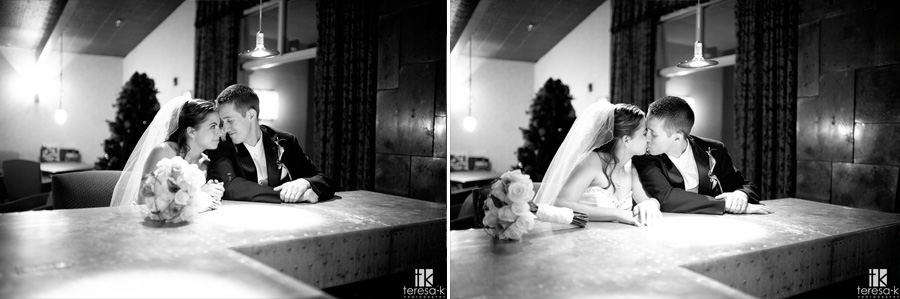 Arden Hills Resort Club Wedding by Sacramento Wedding photographer Teresa K bride and groom at the bar in Arden hills