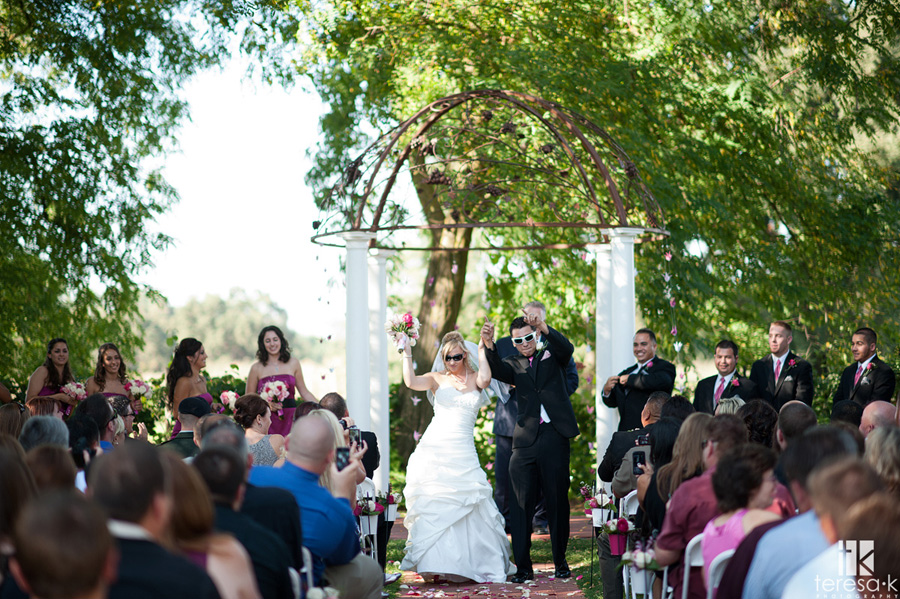 Sacramento area wedding and portrait photographer best of 2011 bride and groom dance down the aisle